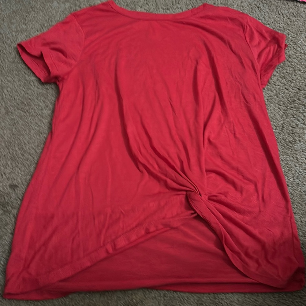 plain red tee with tie at the bottom